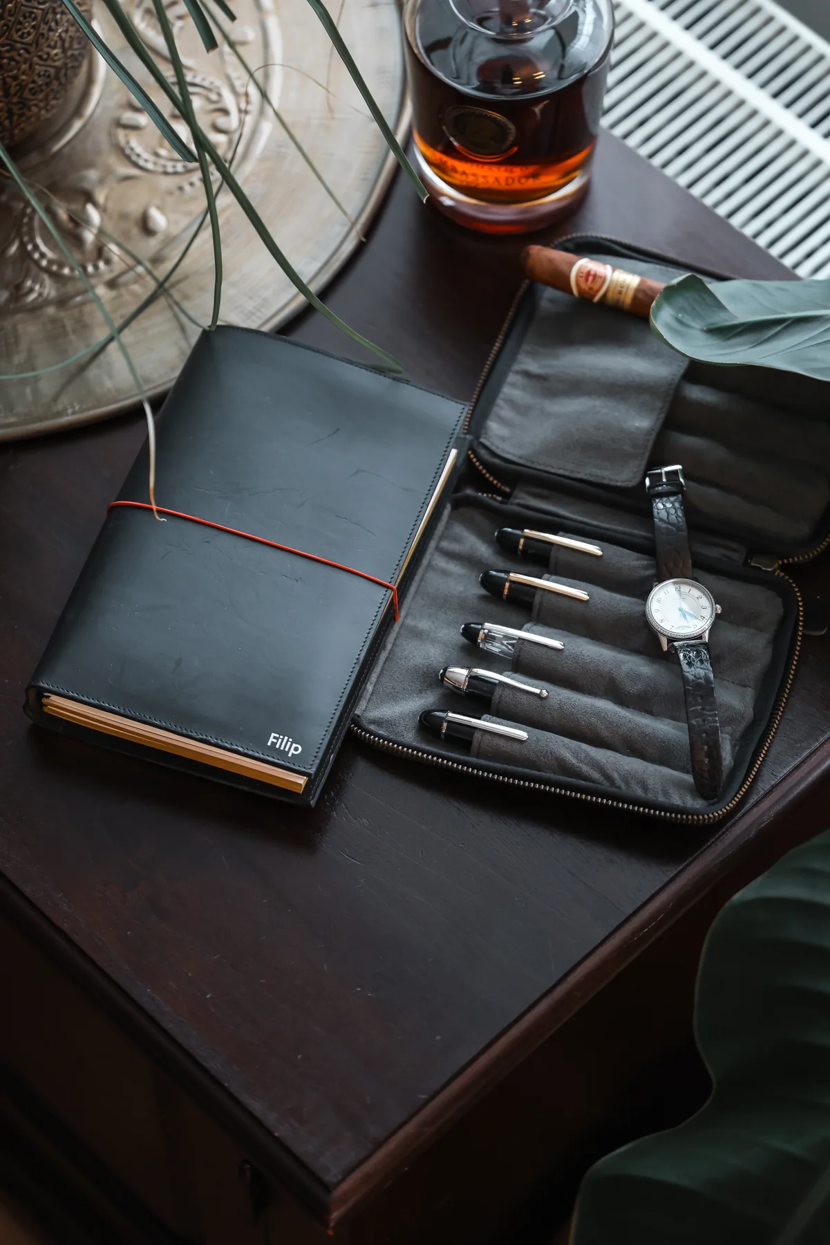 paper republic leather notebook and fountain pens on a desk