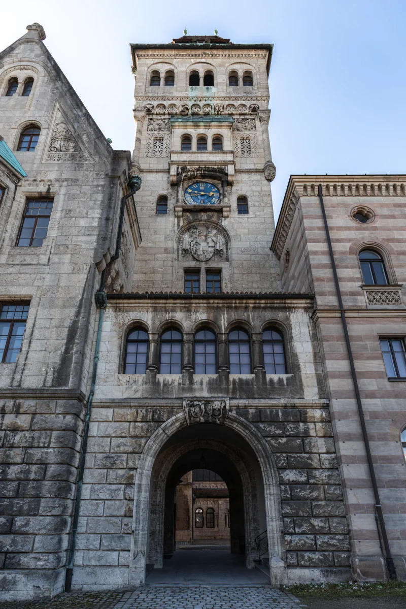 The clock tower and arched entrance of the Faber-Castell castle.