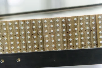 Cross-sections of joined wooden slats with white pencil cores at Faber-Castell.