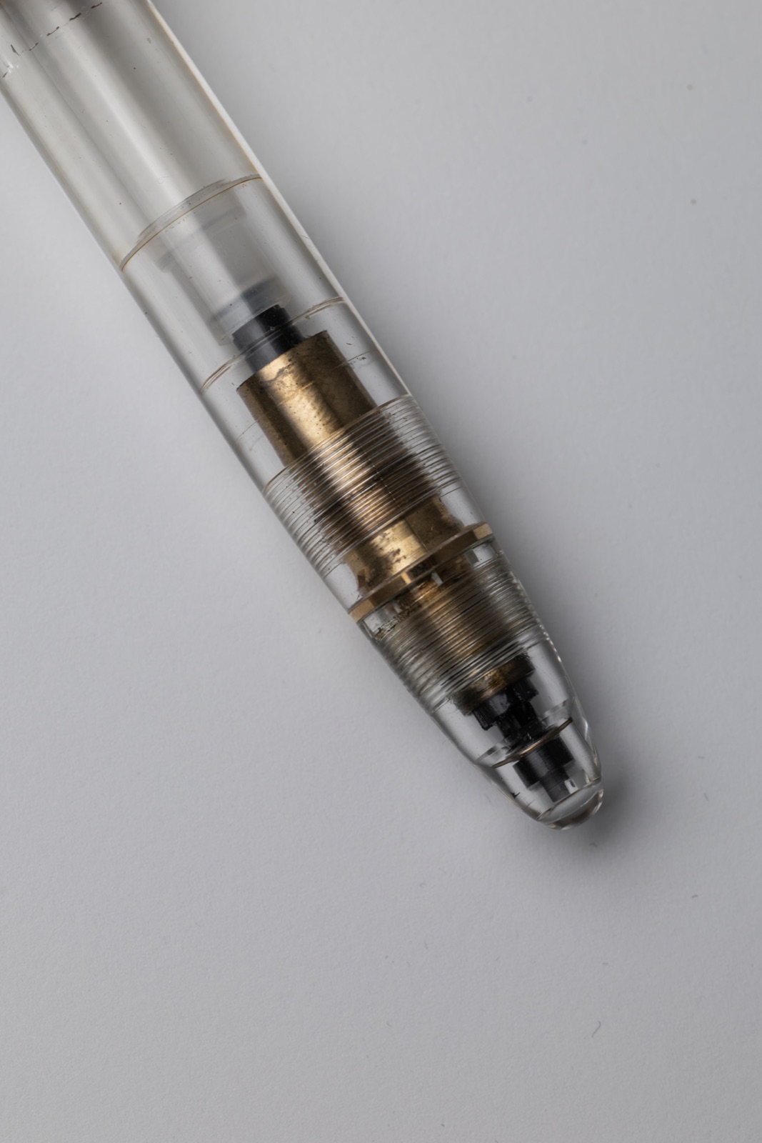 Detail of the Montblanc Meisterstück 149 Demonstrator piston-filling mechanism and metal components through the transparent barrel