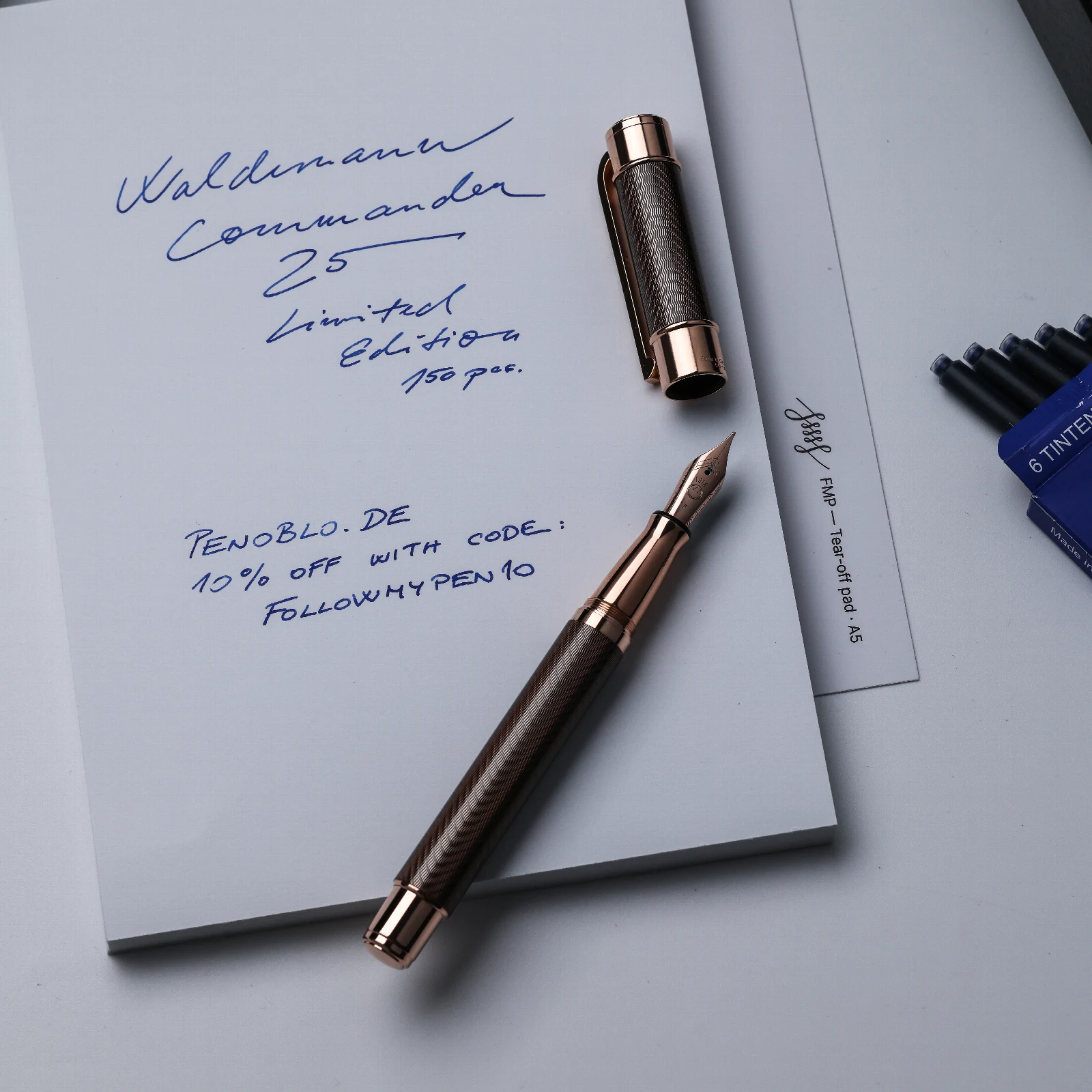 Waldmann Commander 25 fountain pen and cap on a handwritten page