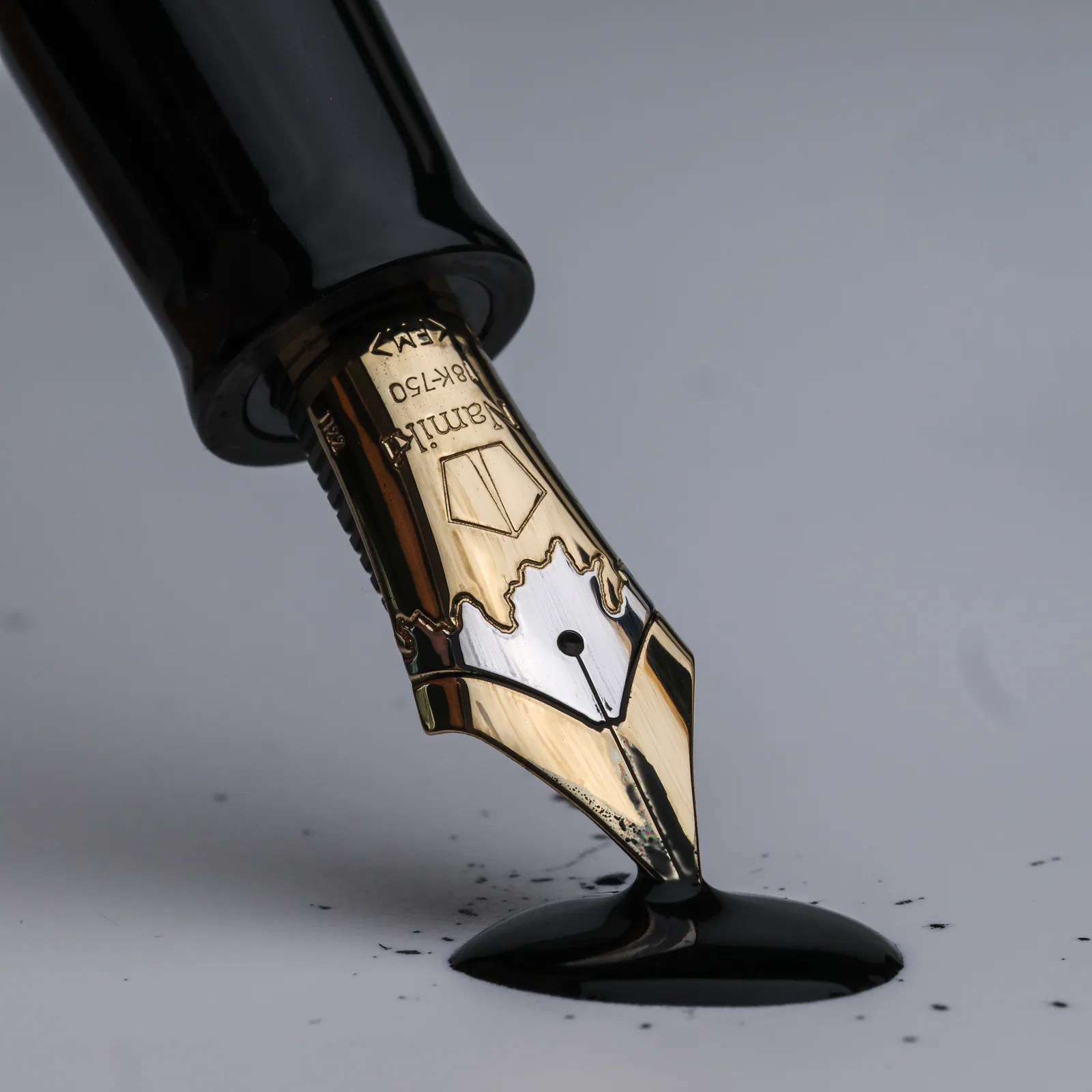 Namiki AYA Hayate Gale Fine Medium 18k gold nib dipped in black ink
