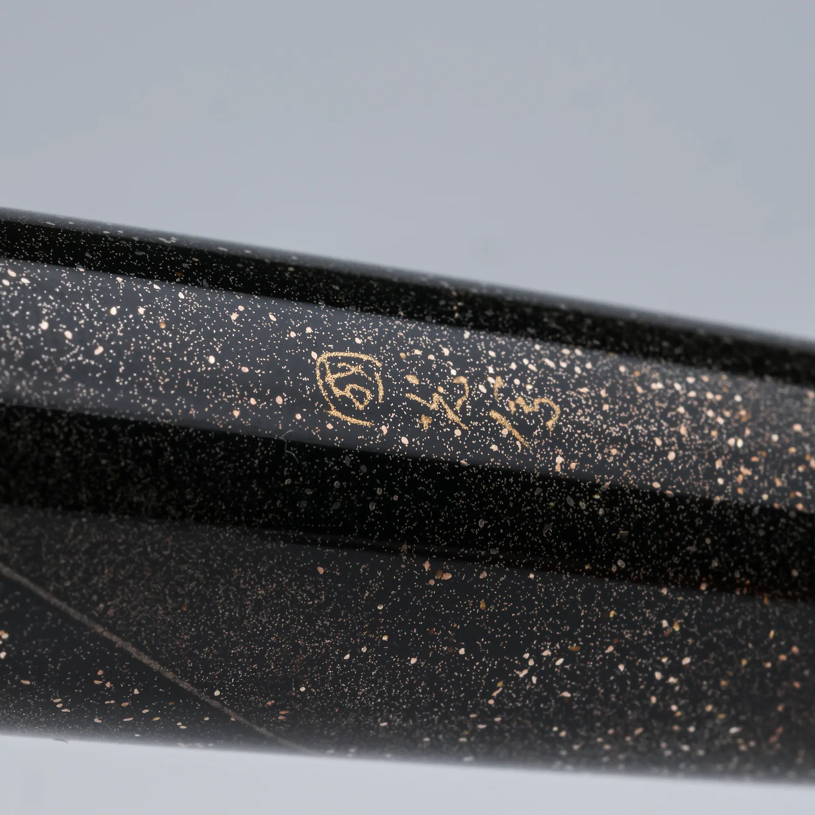 Kokkokai maki-e artisan signature among the silver powder decoration of the Namiki AYA Hayate Gale